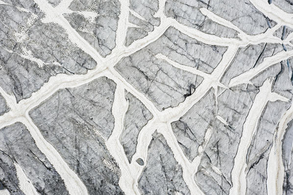 Aerial zenithal view of the summer thaw of Fellaria Glacier. Valmalenco, Valtellina, Sondrio province, Lombardy, Italy, Europe.