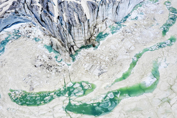 Aerial zenithal view of the summer thaw of Fellaria Glacier. Valmalenco, Valtellina, Sondrio province, Lombardy, Italy, Europe.