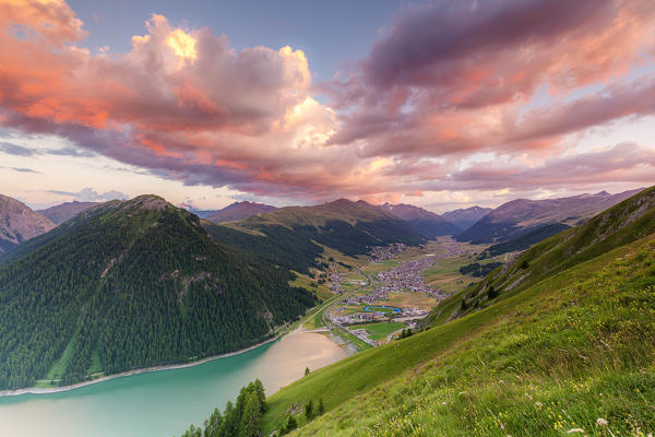 Elevated view of Livigno at sunset. Livigno valley, Valtellina, Lombardy, Italy, Europe.