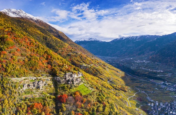 Ancient village of Roncaiola in autumn with view on the valley.  Tirano, Valtellina, Lombardy, Italy, Europe.