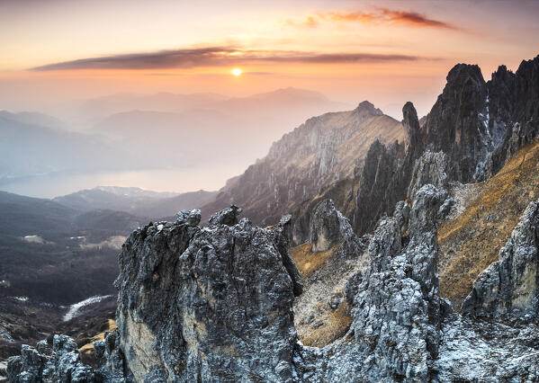 Aerial view of rock pinnacles of Grignetta at sunset. Grigne group, Lake Como, Lombardy, Italy, Europe