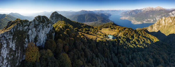 Aerial view of Sev refuge and Corni di Canzo with view on Lake Como in the background. Lombardy, Italy, Europe.