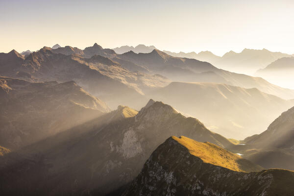 Sunrise light hit Prealpi Orobie. Serina valley,  Lombardy, Italy, Europe.