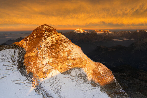 Aerial view of Pizzo Scalino at sunrise with view on Mount Disgrazia. Valmalenco, Valtellina, Lombardy, Italy, Europe.