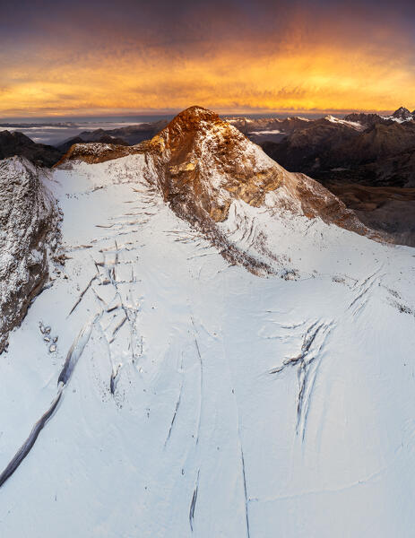 Aerial view of Pizzo Scalino at sunrise with view on the glacier. Valmalenco, Valtellina, Lombardy, Italy, Europe.