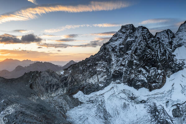 Aerial view of Cima di Vezzeda at sunrise. Engadine valley, Canton of Graubunden, Switzerland, Europe.