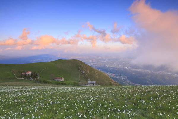 Sunset on Bergamo plain from Monte Linzone, Valico di Valcava(Valcava Pass), Val San Martino, Prealpi Bergamasche, Bergamo province, Lombardy, Italy.