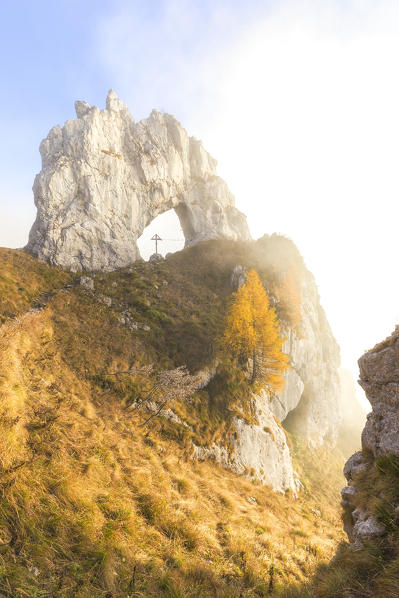 Porta di Prada hidden by fog during autumn. Bocchetta di Prada, Grigna Settentrionale(Grignone), Northern Grigna Regional Park, Lombardy, Italy, Europe.