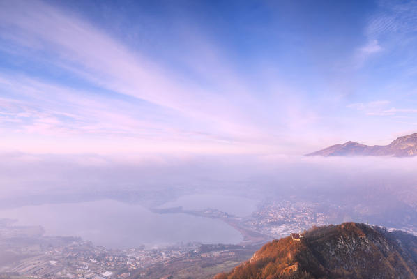 Sunrise over Annone Lake from above. Monte Barro Regional Park, Brianza, Lombardy, Italy, Europe.