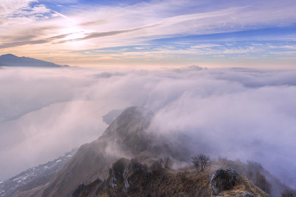 Foggy morning from the top of Monte Barro. Monte Barro Regional Park, Brianza, Lombardy, Italy, Europe.