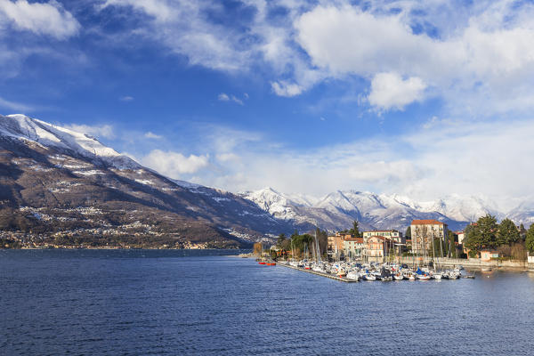 Small port of Bellano after a winter snowfall on the mountains. Bellano, Como Lake, Lombardy, Italy, Europe.