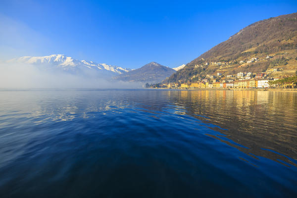 Village of Domaso with fog on the lake. Domaso, Como Lake, Lombardy, Italy, Europe.