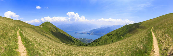 Panoramic view of Monte Crocione with Bellagio and Como lake in the background.  Alpe Colonno, Pigra, Val d'Intelvi, Como Lake, Lombardy, Italy, Europe.