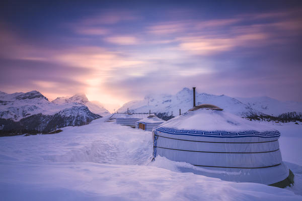 Winter sunset at Mongolian tent at Alp Flix, Sur, Surses, Parc Ela, Region of Albula, Canton of Graubünden, Switzerland, Europe.