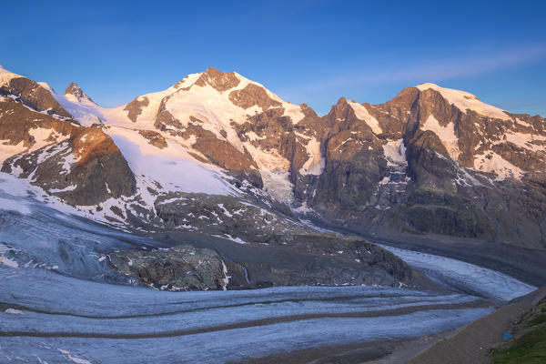 Piz Bernina with Vedret Pers Glacier in the foreground. Diavolezza Refuge, Bernina Pass, Engadin, Graubünden, Switzerland, Europe.