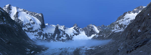 Panoramic view of the Forno Glacier at dusk. Forno Glacier, Forno Valley, Maloja Pass, Engadin, Graubünden, Switzerland, Europe.