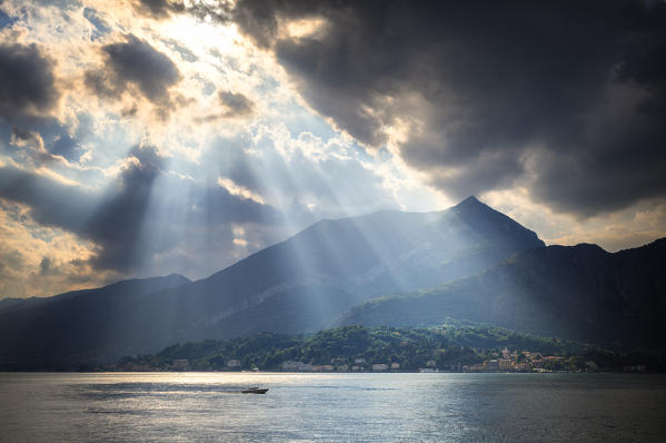 Ray of  sunlight on the lake. Bellagio, Province of Como,  Como Lake, Lombardy, Italy, Europe.