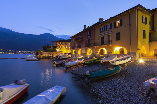 Fishermans houses at dusk. Mandello del Lario, Province of Lecco,  Como Lake, Lombardy, Italy, Europe.