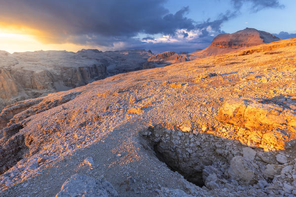 Sunset on Sella Plateau with Piz Boè in the background. Piz Pordoi, Fassa Valley, Trentino, Dolomites, Italy, Europe.