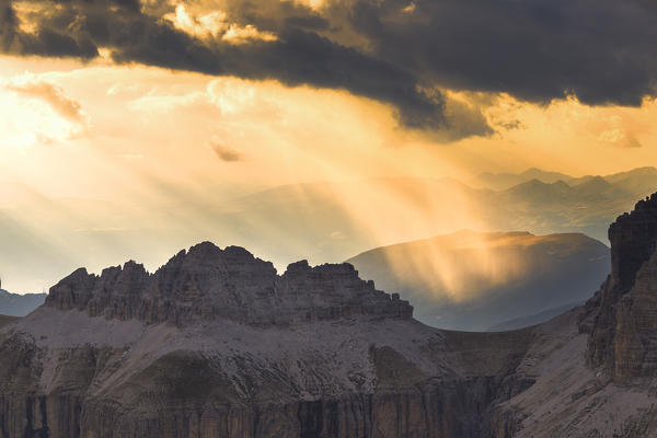 Rain during sunset. Fassa Valley, Trentino, Dolomites, Italy, Europe.