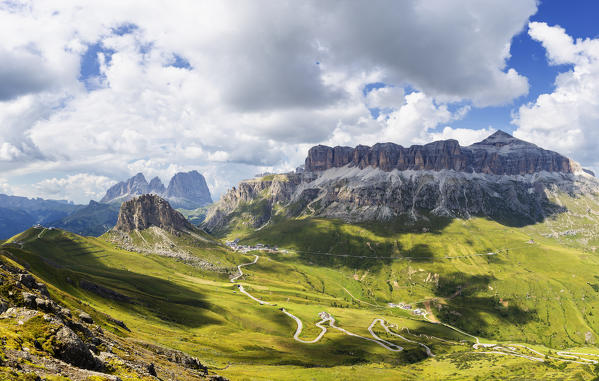 Pordoi Pass road with Sella Group and Sassolungo group. Pordoi Pass, Fassa Valley, Trentino, Dolomites, Italy, Europe.