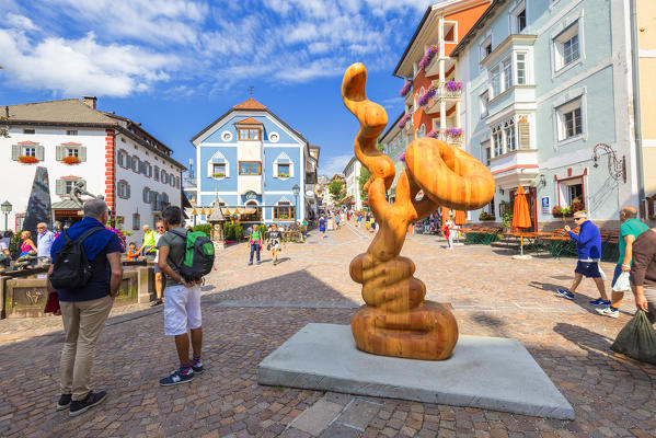 Wood art in the main square of Ortisei, Gardena Valley, Dolomites, South Tyrol, Italy, Europe.