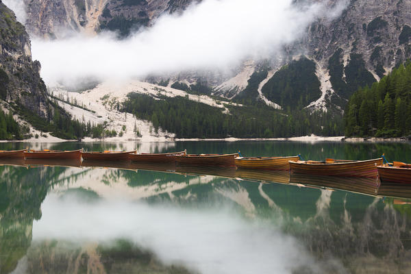 Boats at Braies Lake / Pragser Wildsee,  Braies / Prags, Dolomites, South Tyrol, Italy, Europe.