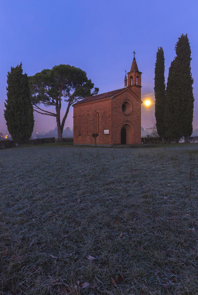 Dawn and lunar sunset on red church of Pomelasca, Brianza, Como province, Lombardy, Italy, Europe
