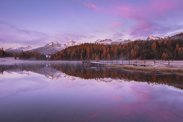 Sunrise on Lej da Staz (Lake of Staz) in autumn time. Celerina/Schlarigna, St Moritz, canton of Graubünden, Engadine, Switzerland, Europe