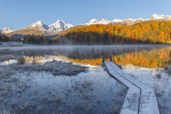 Frozen morning on Lej da Staz (Lake of Staz). Celerina/Schlarigna, St Moritz, canton of Graubünden, Engadine, Switzerland, Europe