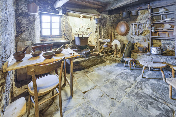 A kitchen of the ancient Cà Bardassa, Fraciscio, Campodolcino, Spluga valley, Sondrio province, Lombardy, Italy, Europe