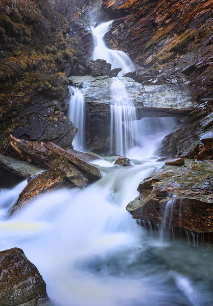 Waterfall near the village of Isola, Lake Sils, Engadine, Canton of Graubunden, Switzerland, Europe