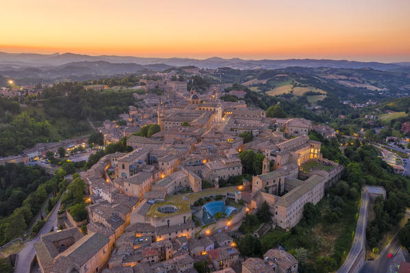 Aerial view of Urbino at dusk. Urbino, Marche, Italy, Europe