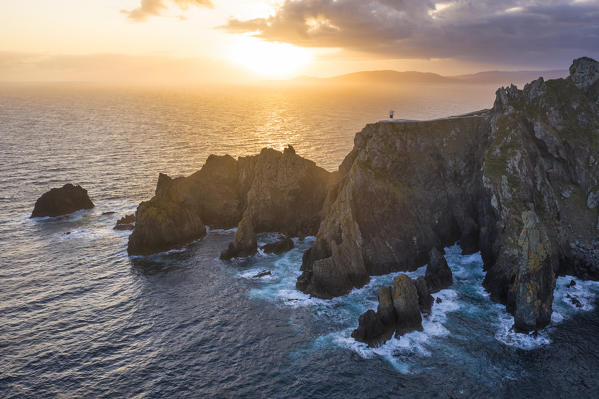 Aerial view of Cape Ortegal lighthouse at sunrise. Carino, La Corona, Galicia, Spain