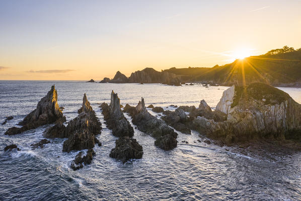 Playa Gueirua, Santa Marina, Asturias, Spain. La Forcada (The Pitchfork) sea stacks at sunrise