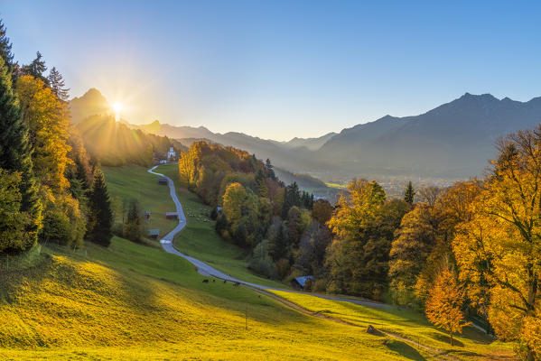 Wamberg, Garmisch Partenkirchen, Bavaria, Germany, Europe. Wamberg village at sunset with Zugspitze mountain in the background
