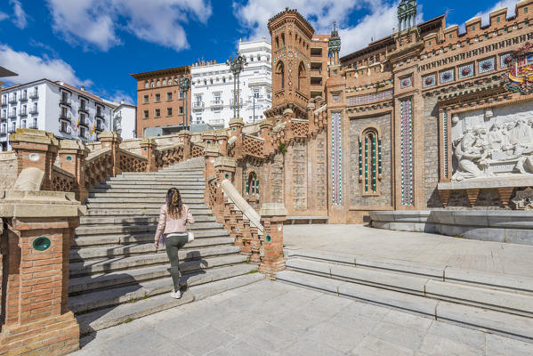 A tourist climb the stairs on the Escalinada del Ovalo. Teruel, Aragon, Spain, Europe (MR)