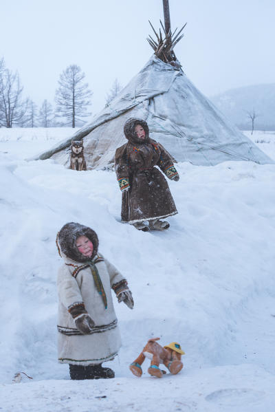 Two small nenets boys at the nomadic reindeer herders camp. Polar Urals, Yamalo-Nenets autonomous okrug, Siberia, Russia