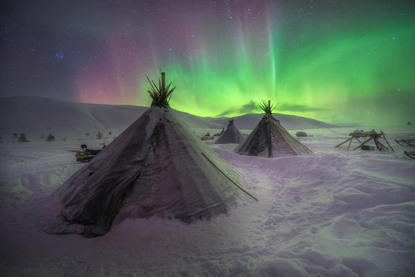 Northern lights at the nomadic reindeer herders camp. Polar Urals, Yamalo-Nenets autonomous okrug, Siberia, Russia