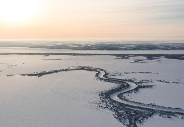 The winter landscape of Russian arctic circle. Frozen river Ob from the plane. Salekhard, Yamalo-Nenets autonomous okrug, Siberia, Russia