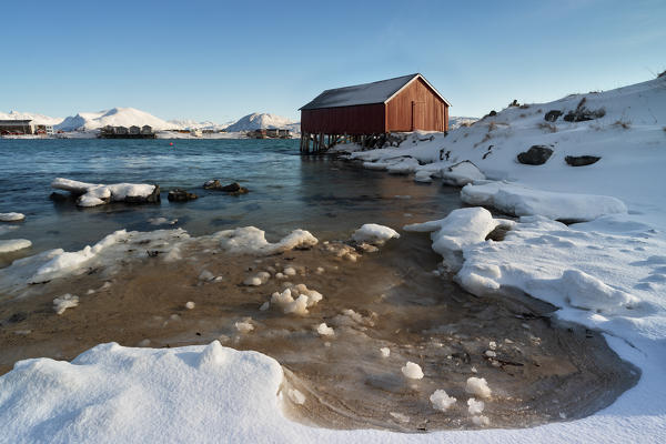 the typical rorbuer house over the coastline, Sommaroy, Brensholmvegen, Troms county, Northen Norway, Europe