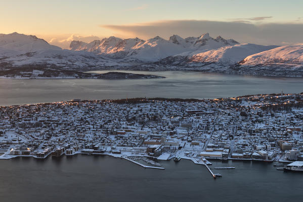 Panoramic view of the city of Tromsø at sunset from the mountain top reached by the Fjellheisen cable car, Troms county, Northern Norway, Europe
