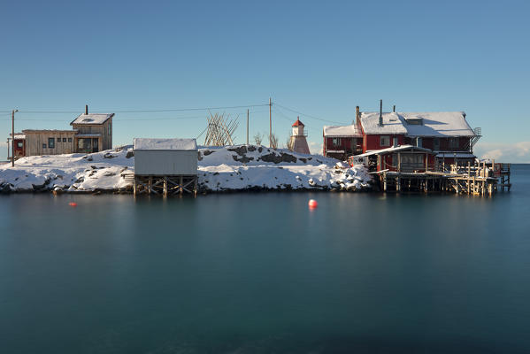a long exposure to take a photo of Bovaer, on a cold winter morning, Bergsfjorden, Senja, Northern Norway, Europe.