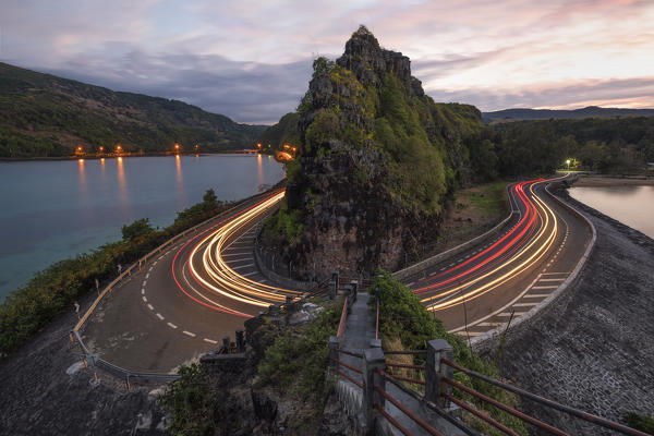 car trails effect taken at Captain Matthew Flinders monument at sunrise, Black River distric, Mauritius, Indian Ocean, Africa