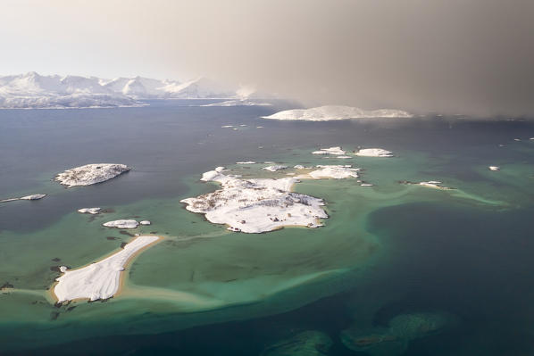 aerial view of the islands of Sommaroy in winter time, Brensholmvegen, Troms county, Northen Norway, Europe