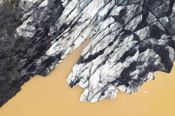 aerial vertical view taken by drone of Sólheimajökull glacier during a summer day, Sudurland, Iceland, Europe 