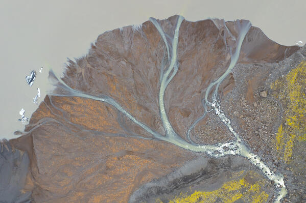 aerial vertical view taken by drone of Sólheimajökull glacier during a summer day, Sudurland, Iceland, Europe 