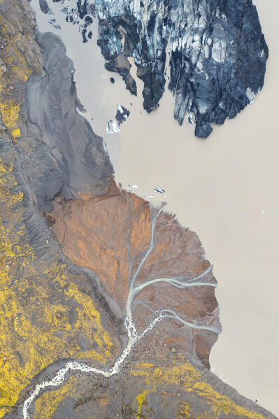 aerial vertical view taken by drone of Sólheimajökull glacier during a summer day, Sudurland, Iceland, Europe 
