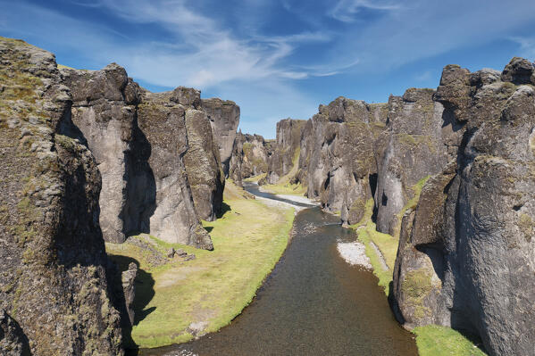aerial view taken by drone of Fjadrargljufur Canyon during a summer day, Sudurland, Iceland, Europe 