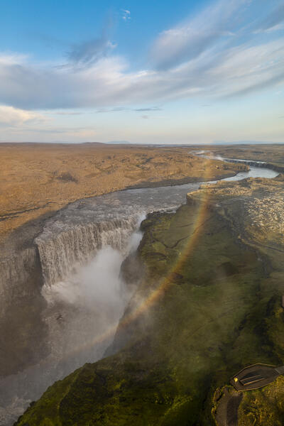 a drone captures a rainbow over the Dettifoss waterfall in a summer time, Nordulrand, Iceland